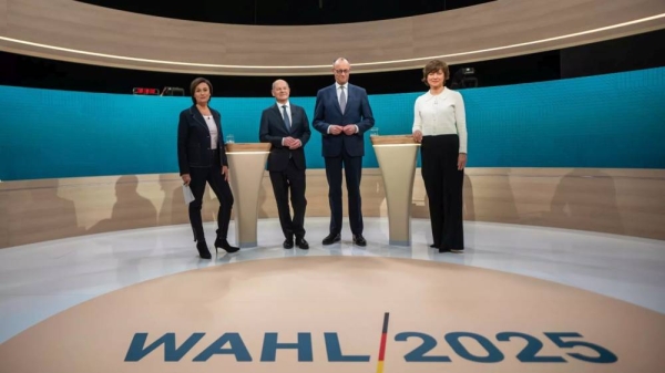 German Chancellor Olaf Scholz, centre left, and Friedrich Merz, CDU candidate for chancellor, before a TV election debate in Berlin, 9 February, 2025 -