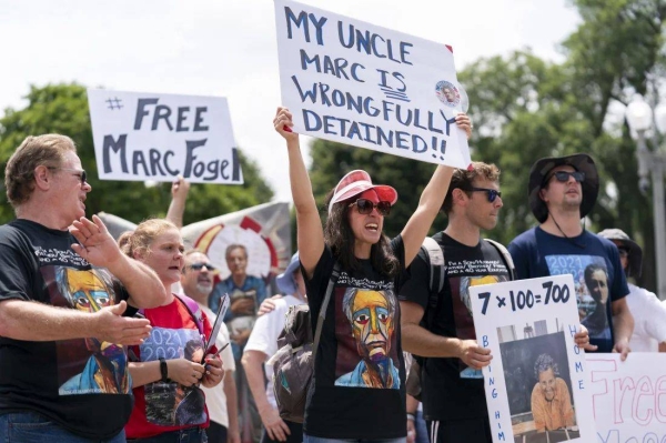 Ellen Keelan and other family members rally outside the White House for the release of Marc Fogel, who has been detained in Russia since August 2021, Saturday, July 15, 2023