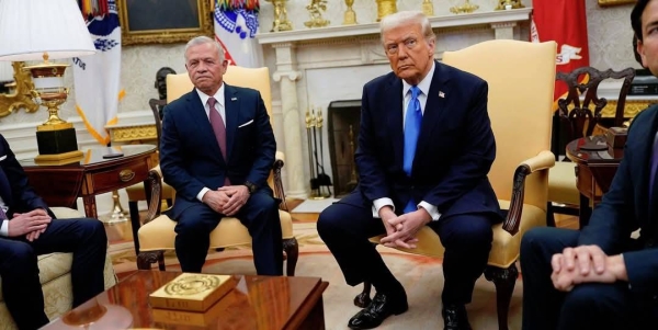 US President Donald Trump speaks with Jordan's King Abdullah II at the White House, February 11