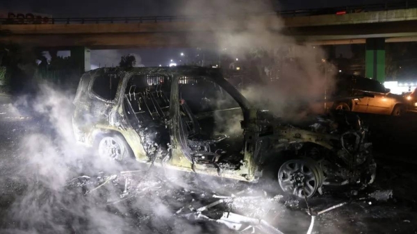 The United Nations Interim Force in Lebanon said one of its vehicles was torched, wounding its outgoing deputy commander in Beirut on Friday.