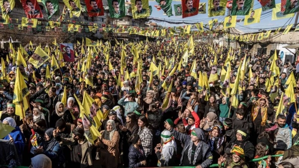 Demonstrators march to demand the release of Kurdish leader Abdullah Ocalan in Qamishli, northeastern Syria, Saturday 15 Feb, 2025