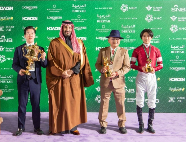 Crown Prince Mohammed bin Salman presents awards to the winners of the Saudi Cup in Riyadh.