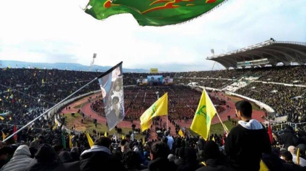 People waved flags, chanted and held portraits of Hezbollah leaders Hassan Nasrallah and Hashem Safieddine during the event