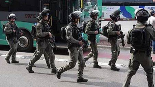 The stabbing, which the police are treating as a militant attack, took place in a bus station