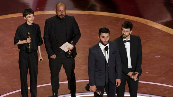 Rachel Szor, Hamdan Ballal, Basel Adra and Yuval Abraham accept the Documentary Feature Film award for 'No Other Land' onstage during the 97th Annual Oscars at Dolby Theatre on March 02, 2025 in Hollywood, California