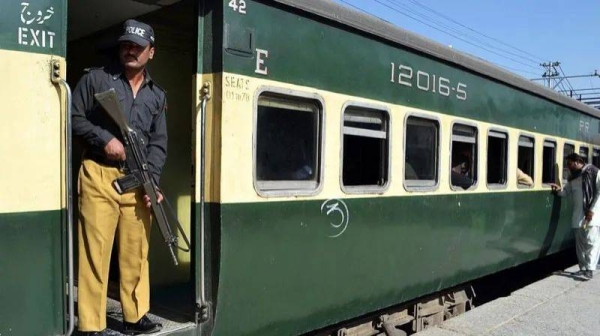 File image shows Pakistani policeman on a train in Quetta