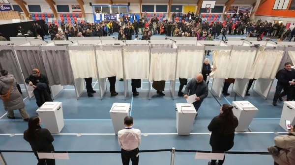 Voters lining up to cast their ballots in parliamentary elections in Nuuk, Greenland, on March 11, 2025