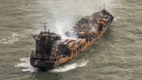 Smoke rises from the Solong cargo ship in the North Sea on Tuesday