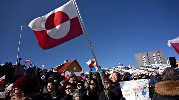 Protesters march in front of the US consulate in Nuuk, Greenland, on March 15, 2025