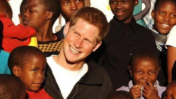 Prince Harry meeting children at a Lesotho children's home in 2006