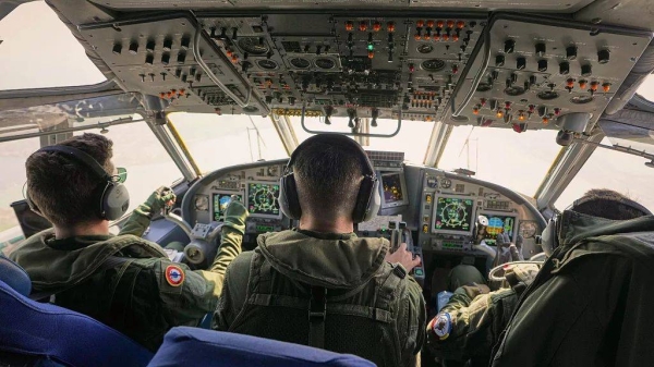 Crew members fly a French Navy Atlantique-2 submarine hunter naval airplane during a NATO military exercise in Romania, 9 April, 2025