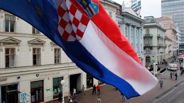 The flags of Croatia and EU fly over the Ban Jelacic square in Zagreb. (File)