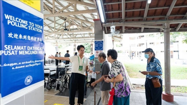 Voting underway in Singapore’s general election with nearly half of voters casting ballots by noon