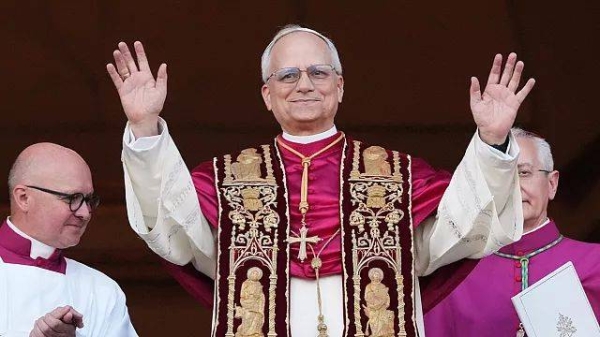 Pope Leo XIV appears on the balcony of St Peter's Basilica after his election, at the Vatican, 8 May 2025