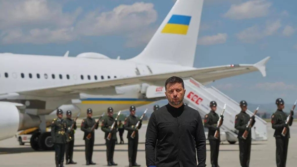 Ukrainian President Volodymyr Zelensky talks to journalists as he arrives at Esenboga airport in Ankara, Turkey, Thursday, May 15, 2025