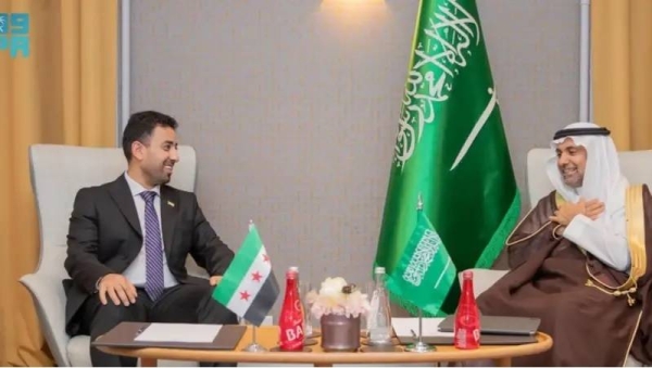 Saudi Health Minister Fahd Al-Jalajel meets with his Syrian counterpart Musab Al-Ali in Geneva.
