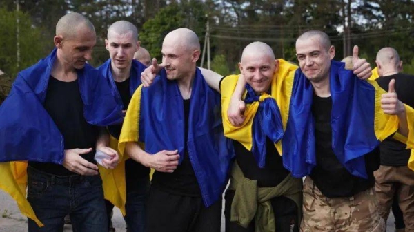 Some of the released Ukrainians were pictured shortly after they were freed by Russia