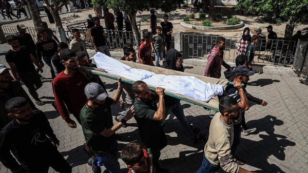 Israeli airstrikes kill 14 in Gaza, including woman and two children