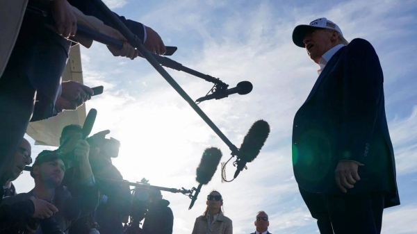 President Donald Trump speaks to the media before boarding Air Force One as he departs for Washington, DC, at Morristown Municipal Airport in Morristown, New Jersey, on May 25