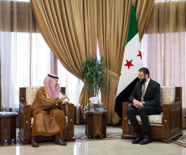 Syrian President Ahmed Al-Sharaa receives Saudi Foreign Minister Prince Faisal bin Farhan.