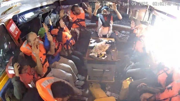 A photo posted on Telegram purportedly showing activists with their hands up on board the Madleen