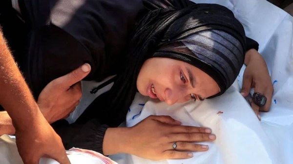 A mourner during the funeral of one of those killed while attempting to get food aid in Rafah