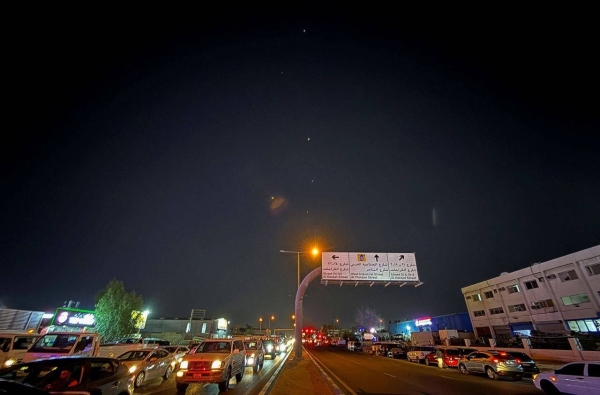 Traces are seen in the sky after Iran's armed forces say they targeted Al-Udeid Air Base in a missile attack in Qatar on Monday.