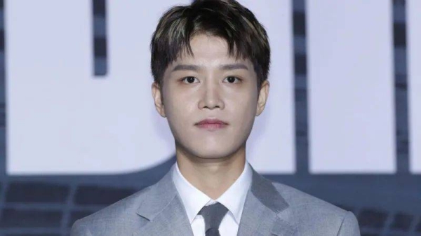 Taeil, former member of the K-pop band NCT, poses for the camera at a press conference in Seoul