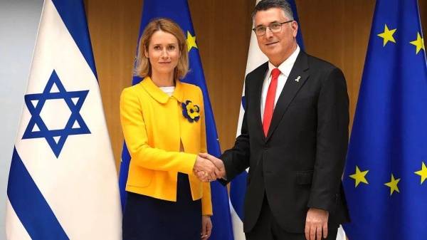 European Union foreign policy chief Kaja Kallas, left, shakes hands with Israel's Foreign Minister Gideon Sa'ar during the EU-Israel Association Council