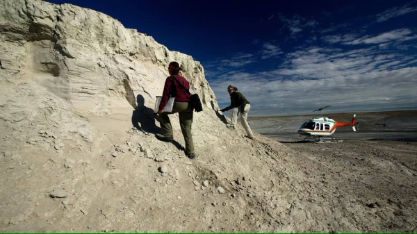 Ryan Paterson, right, and Enrico Cappellini, left, led the analysis on the rhino tooth fossil