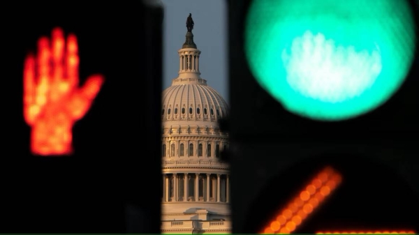 Stoplights change in front of the US Capitol as Republican lawmakers struggle to pass US President Donald Trump's sweeping spending and tax bill, on Capitol Hill in Washington, DC, on June 30, 2025.