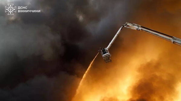 Crews tackle a fire caused by a Russian air strike in Vinnytsia, 16 July, 2025