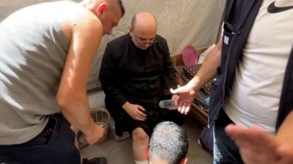 Father Gabriele Romanelli was among those who needed medical treatment