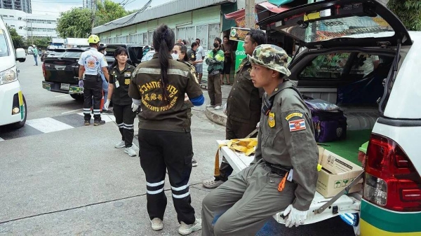 Emergency workers at the scene of the shooting. 