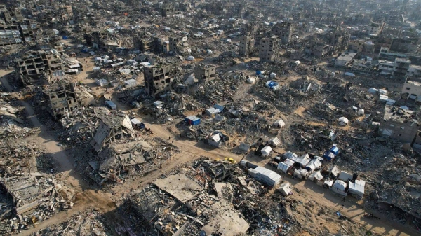 An aerial photograph shows tents amidst the destruction caused by the Israeli air and ground offensive in Beit Lahiya, 17 February, 2025