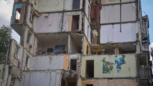 A view on the multistory residential house that was hit by the Russian missile Thursday night, in Kyiv, Ukraine, Friday, Aug. 1, 2025