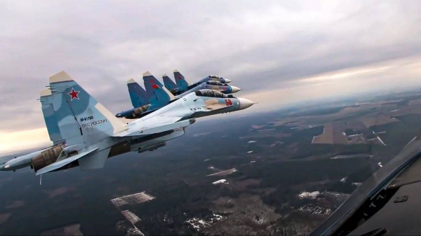 Su-30 fighters of the Russian and Belarusian air forces fly in a joint mission during military drills in Belarus  on Feb. 17, 2022