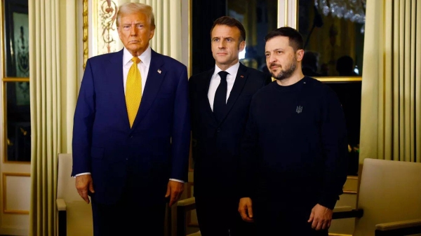 Then-US President-elect Donald Trump, French President Emmanuel Macron, and Ukraine's President Volodymyr Zelensky at the Elysee Palace in Paris, 7 Dec. 2024