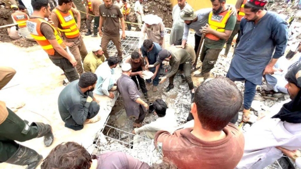 Rescuers in Khyber Pakhtunkhwa clawed through rubble by hand to find survivors