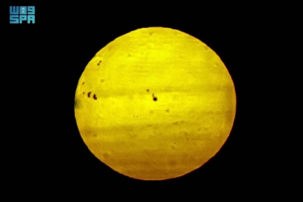Sunspots are temporary dark regions on the sun’s surface, cooler than their surroundings due to intense magnetic activity, inhibiting the normal flow of heat.
