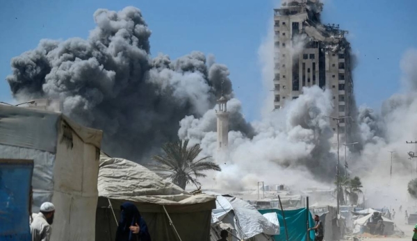 Israel orders Gaza City evacuation, bombs high-rise towers