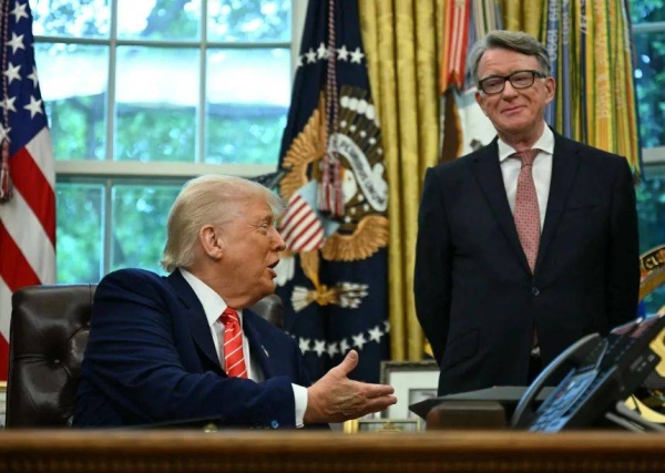 President Donald Trump shakes hands with Mandelson in the White House on May 8