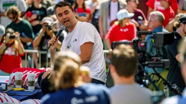 Charlie Kirk, shown here at the event in Utah before he was killed, became known for his debates with liberal students