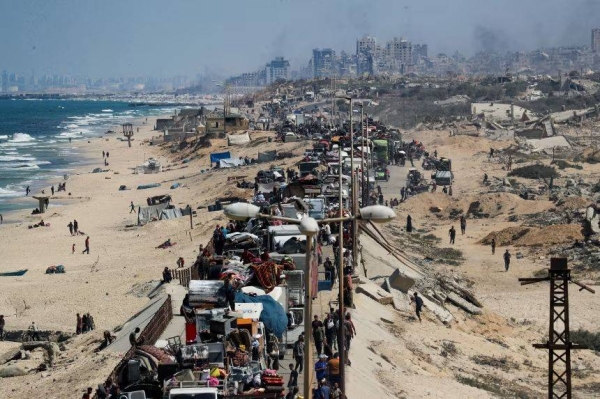 Thousands of displaced Palestinians are attempting to move south on Tuesday after Israeli forces launched a ground assault on Gaza City
