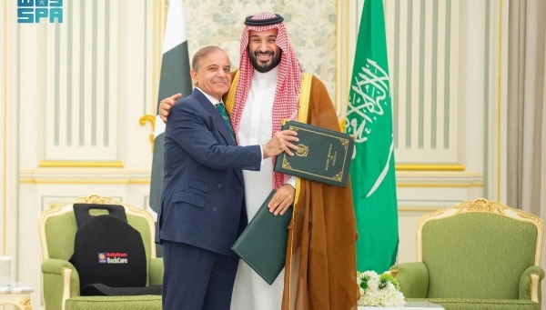 Saudi Crown Prince and Prime Minister Mohammed bin Salman with Pakistani Prime Minister Shehbaz Sharif during the signing of joint strategic defense agreement in Riyadh on Wednesday.