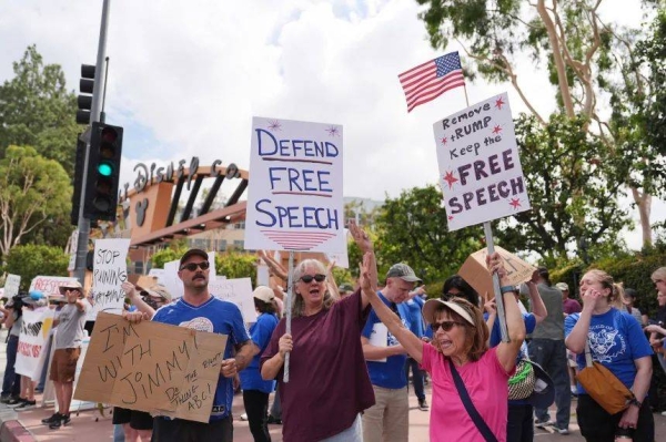 Demonstrators picket in response to the suspension of Jimmy Kimmel's late-night show outside of The Walt Disney Studios Thursday, Sept. 18, 2025,