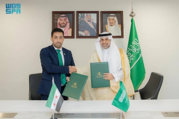 Saudi Minister of Health Fahad Al-Jalajel and his Syrian counterpart Dr. Musab Al-Ali during the ceremony of signing a memorandum of understanding in Riyadh on Sunday to enhance cooperation in the health sector .