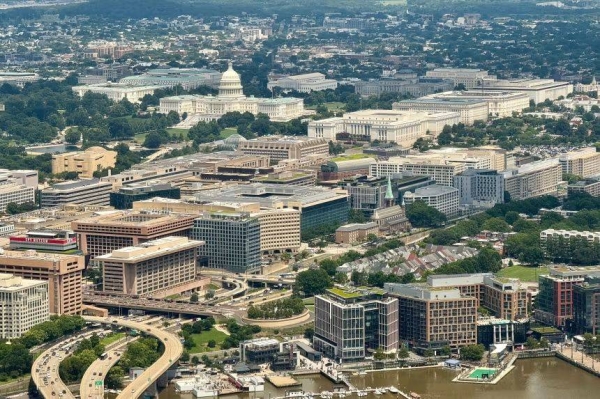 An aerial view of the US Capitol building and Washington, DC