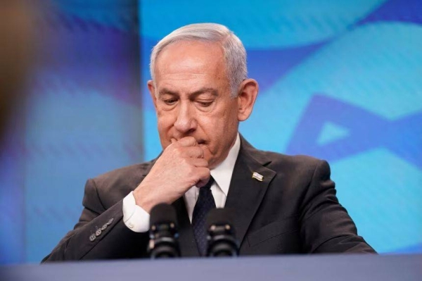 Israeli Prime Minister Benjamin Netanyahu reacts at a press conference in Jerusalem in September