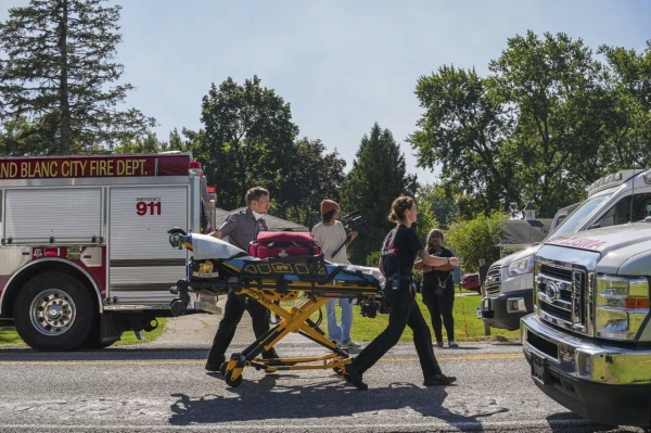 Emergency services are seen near the intersection of Holly Road and McCandlish Road near The Church of Jesus Christ of Latter-day Saints